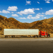 Well-maintained truck on highway to avoid truck breakdowns long hauls